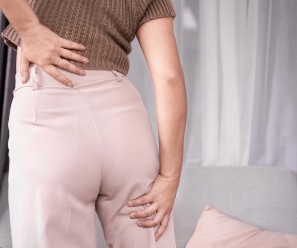 Woman with sciatica pain